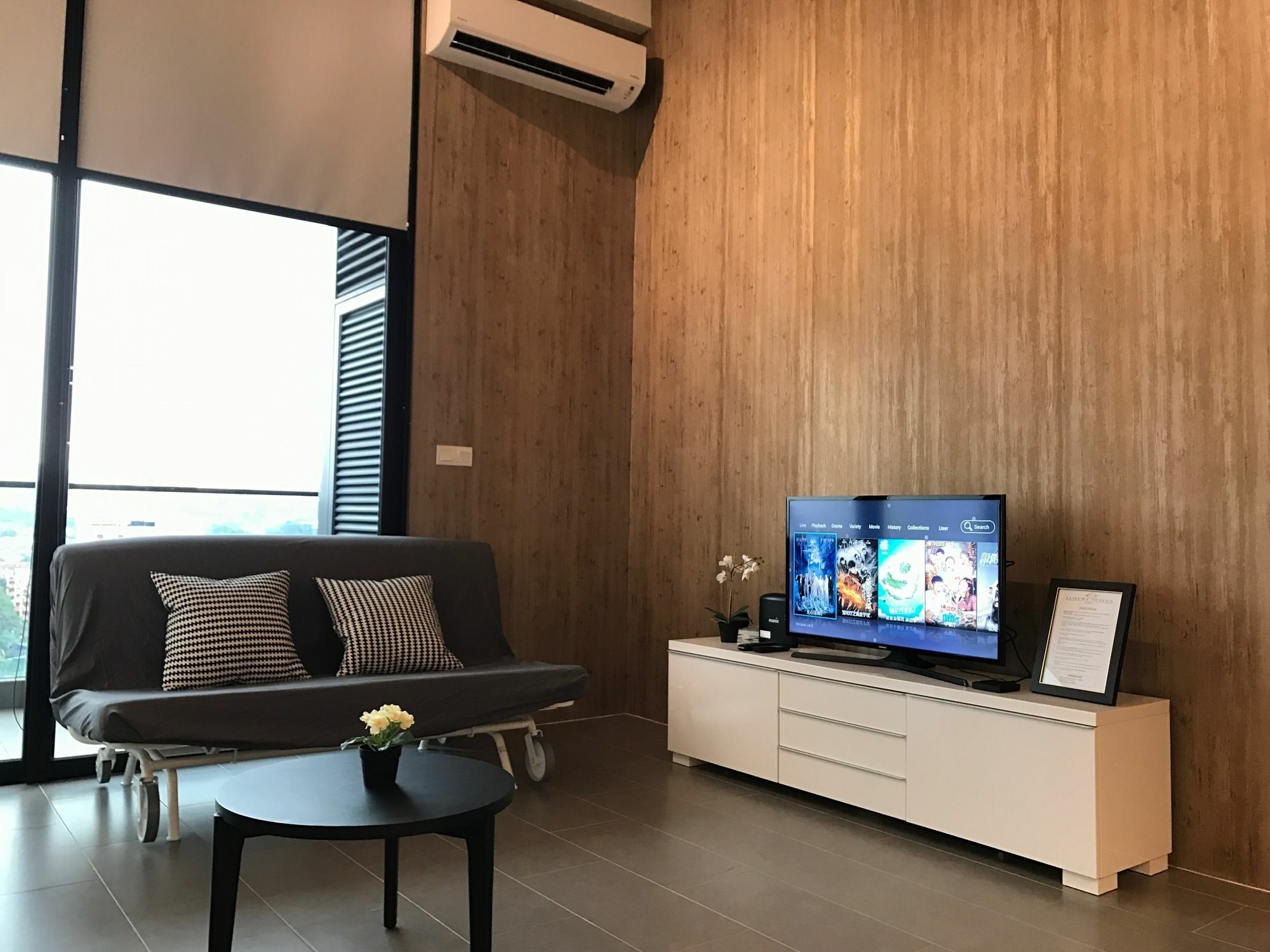 Alila Bangsar Kuala Lumpur Hotel Exterior photo A living room with a television