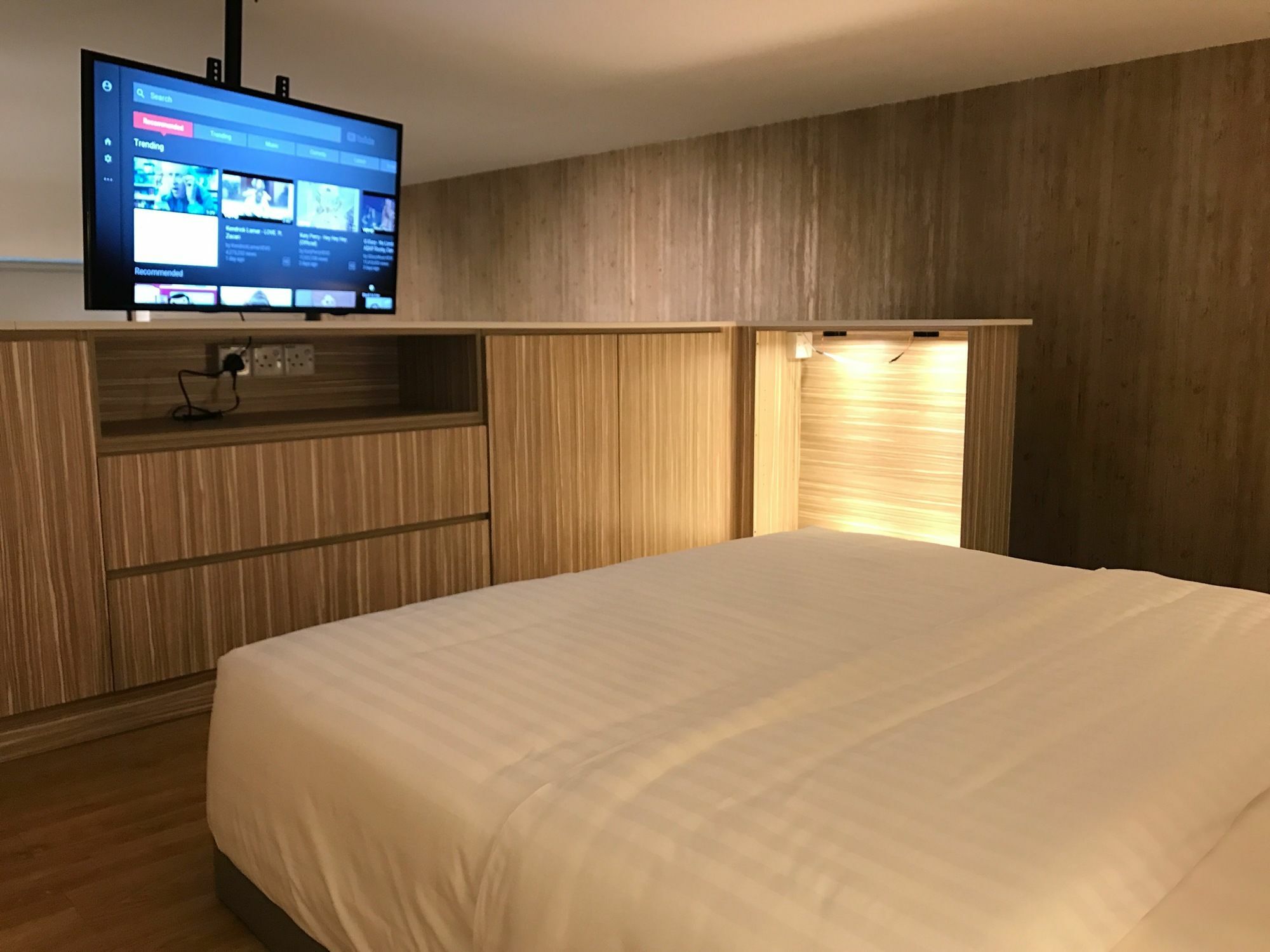 Alila Bangsar Kuala Lumpur Hotel Exterior photo A television mounted on a wall in a hotel room